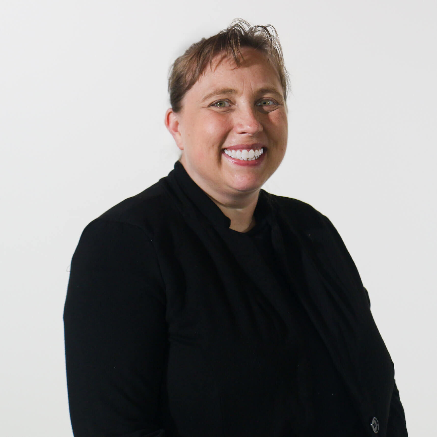 Tawny Compressed Headshot